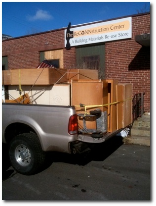 A Truck Arrives at the ReCONNstruction Center with our Kitchen Cabinets